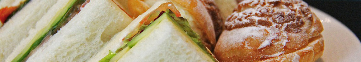 Eating Fast Food Sandwich at Great Wraps restaurant in Woodbridge, VA.